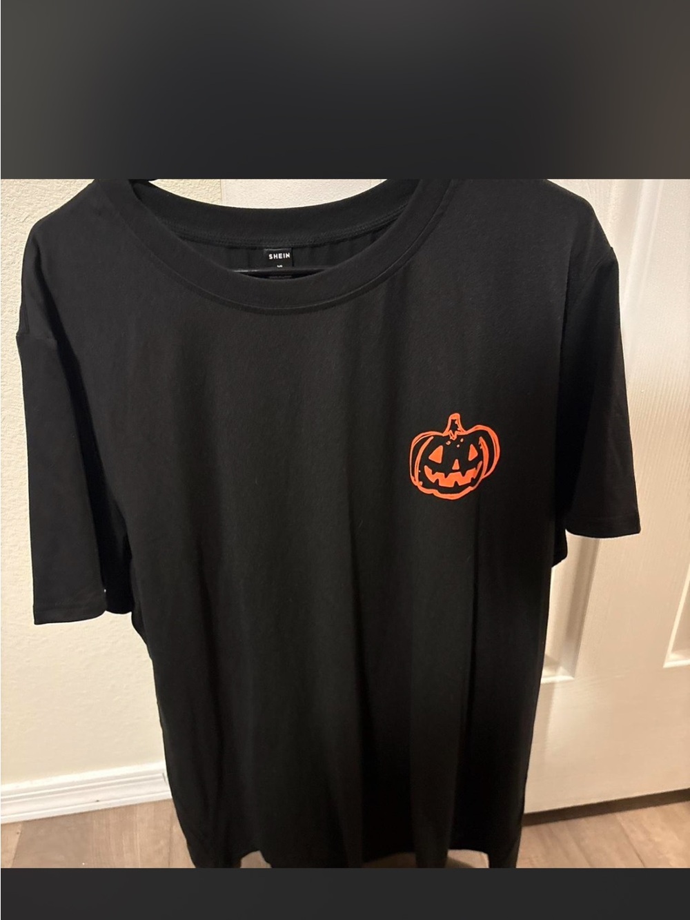 SHEIN Black Short-Sleeve Tee with Orange Pumpkin Graphic